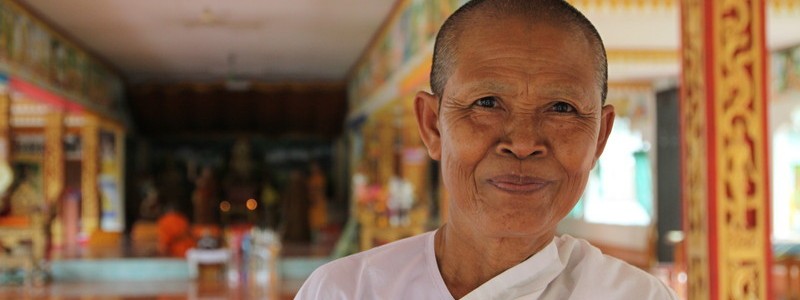 Pakse, Laos A nun in a remote temple around Pakse, Laos